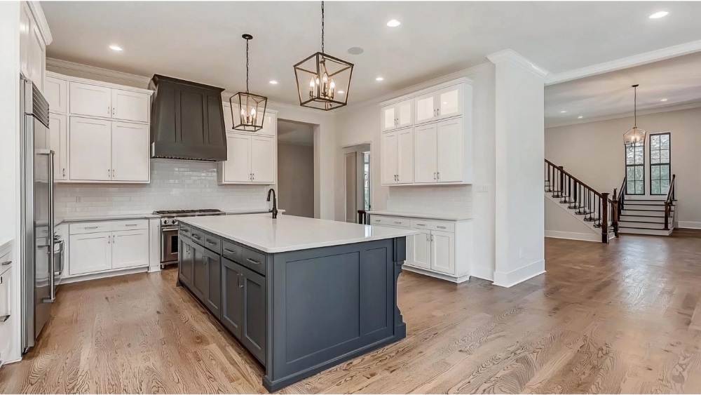a two tone kitchen design with white and blue kitchen cabinets