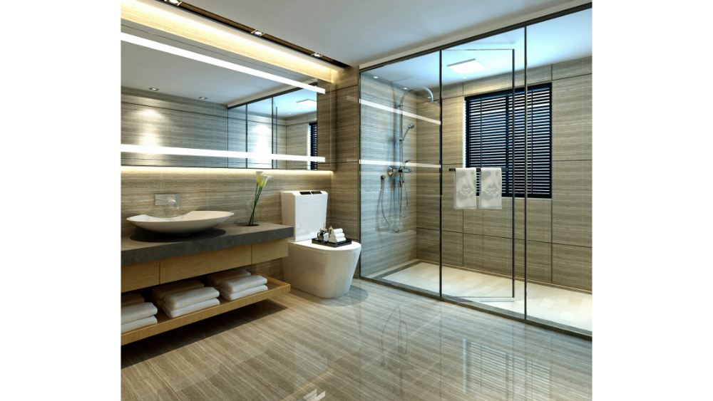 Contemporary bathroom with glass shower, modern fixtures, and neutral tones.